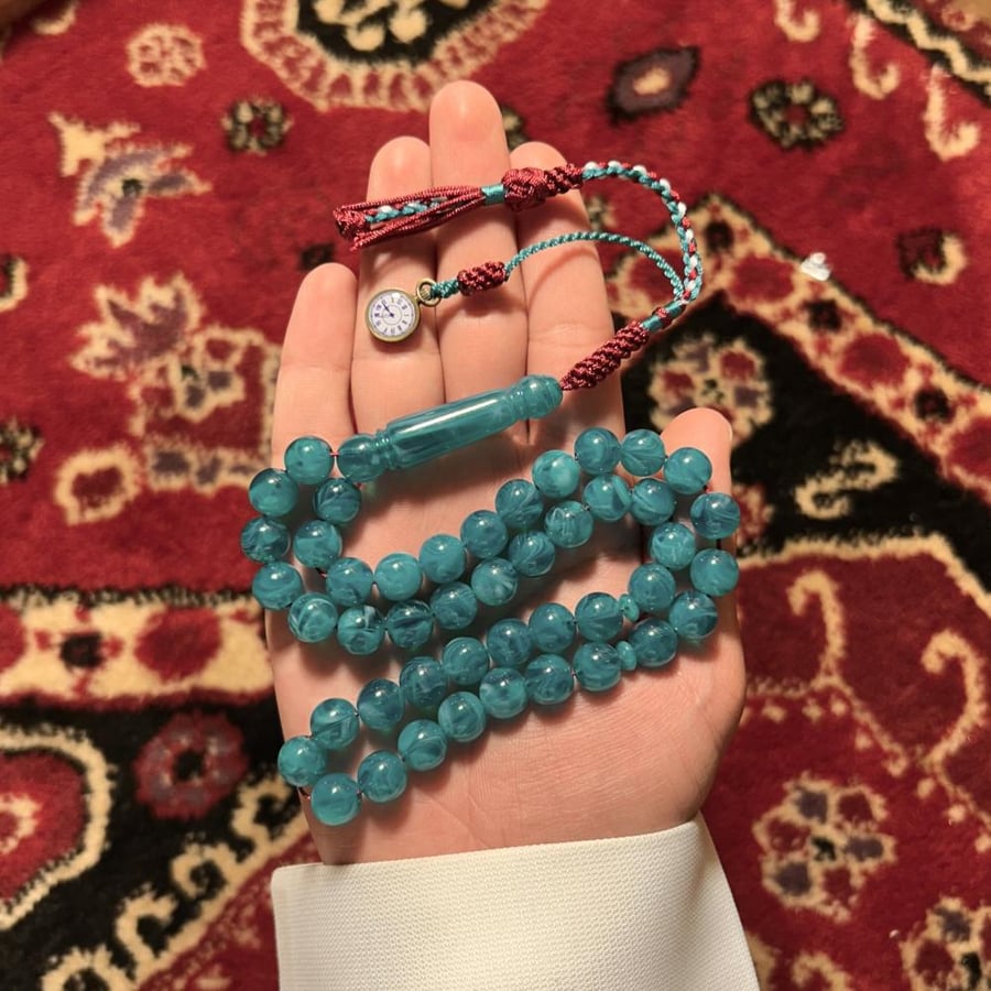 مسباح راتنج تركوازي كركوشة . ساعة