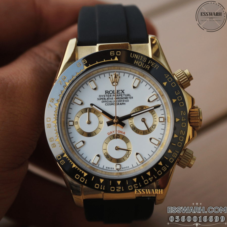 Rolex Daytona Cosmograph watch - Battery operated, rubber strap, white dial, gold bezel, seconds hand, automatic movement, size 40
