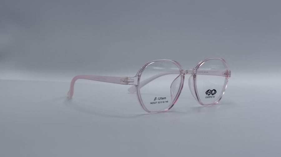 Women's round plastic eyeglasses in transparent pink color model number MZ027C4