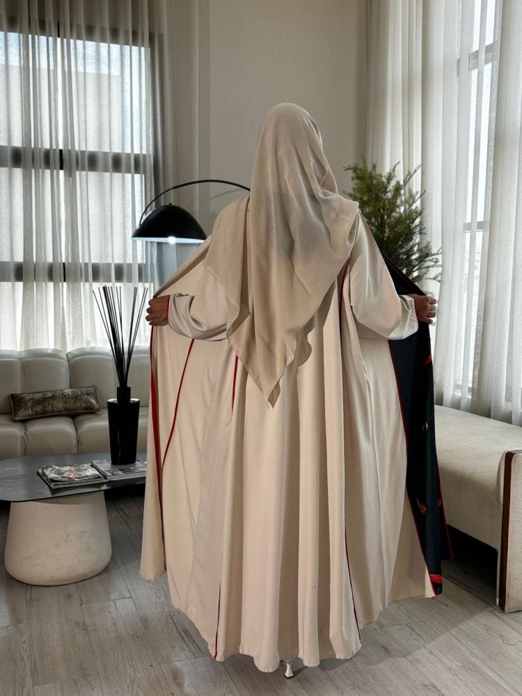 عباية كلوش كريب بيج بتفاصيل سوداء وزهور حمراء