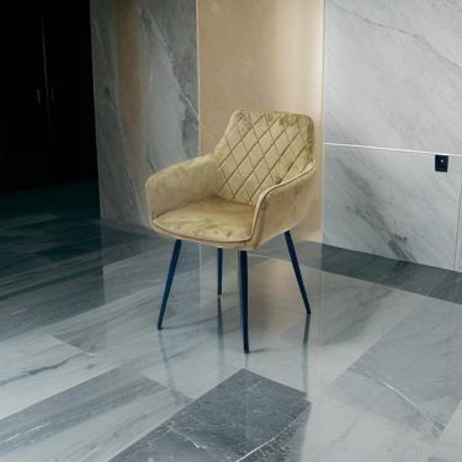 Single velvet chair in brown color