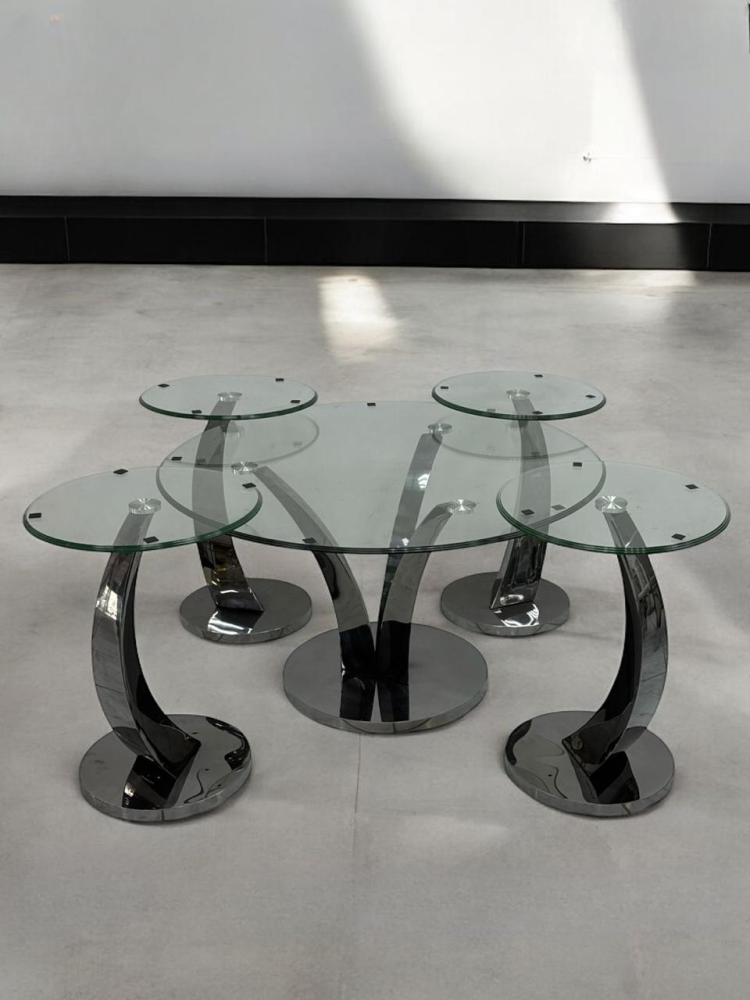 Set of stainless steel and glass service tables in various colors