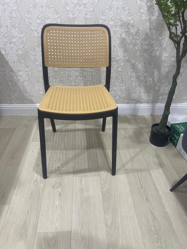 Single black rattan chair