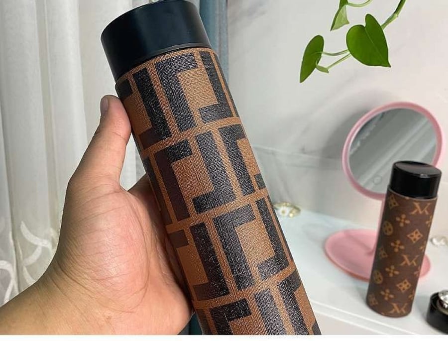 مق مع مقياس حراري