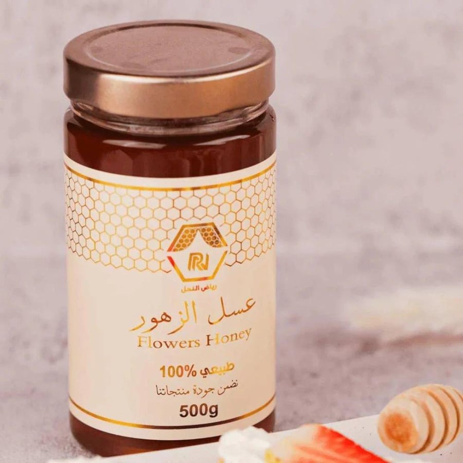 عسل زهور بالشمع رياض النحل 500جم