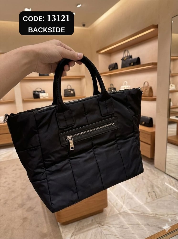 شنطة ماركة برادا