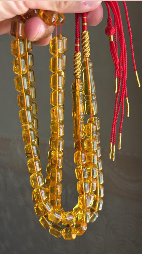 مسباح كهرمان شفاف ( شوائب خفيفه ) برميلي