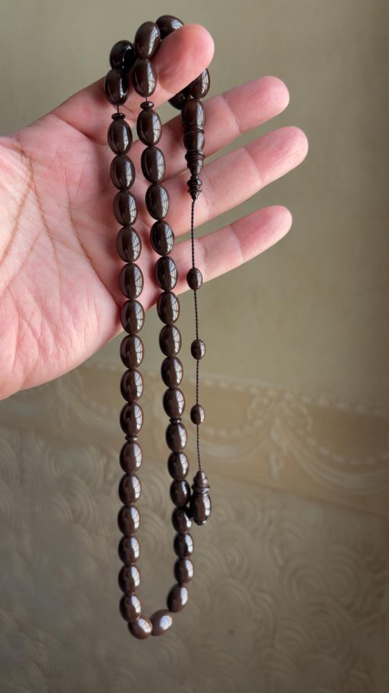 مسباح بولنج بني غامق قديم ( بيضاوي )