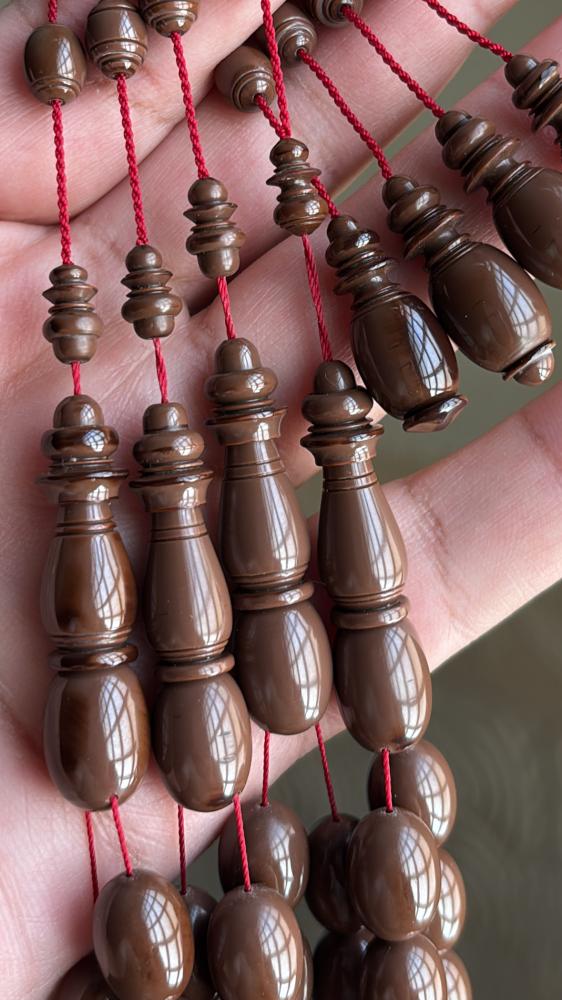 مسباح بولنج بني فاتح قديم ( بيضاوي )