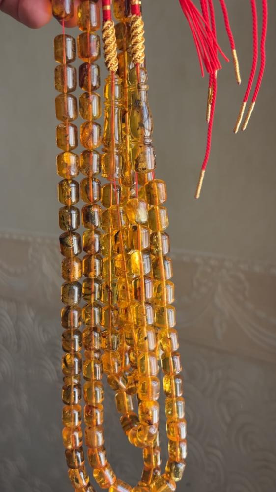 مسباح كهرمان شفاف ( شوائب خفيفه ) برميلي