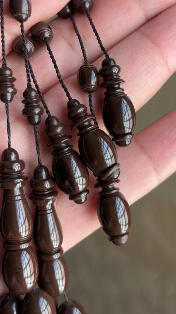 مسباح بولنج بني غامق قديم ( بيضاوي )