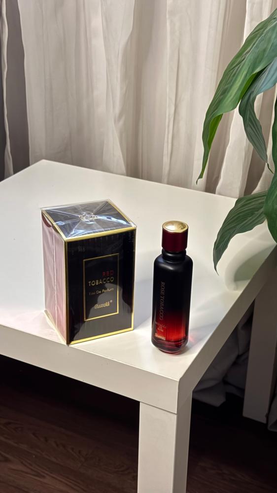 عطر روز توباكو الأصلي