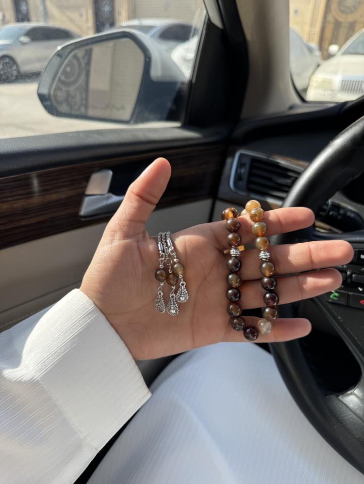 A brown-colored agate prayer bead