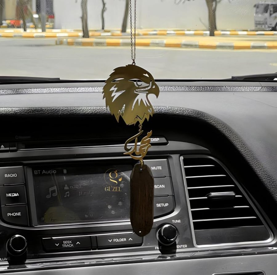 تعليقة سيارة مع كسره العود