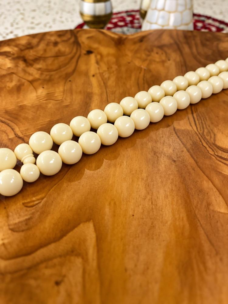 سبحة ضومنة أبيض عاجي