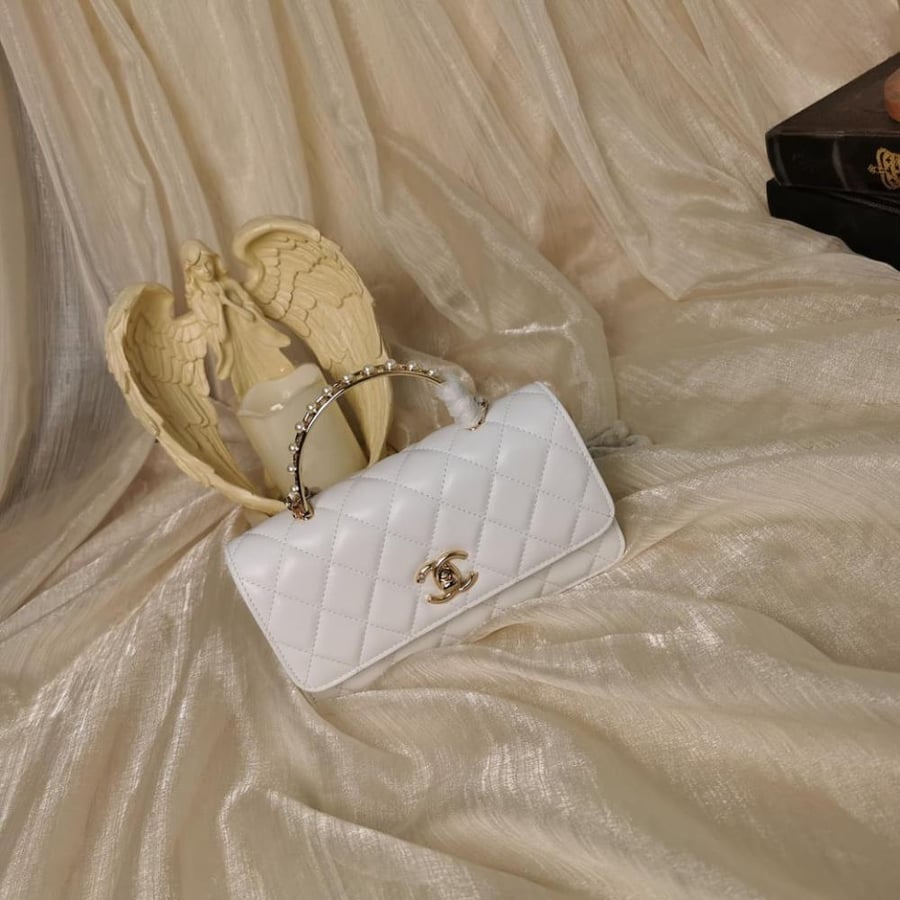 CHANEL PEARL ACCORDION HANDBAG