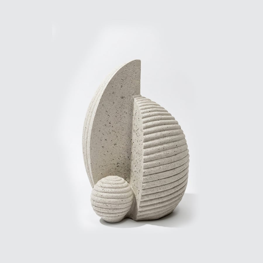 Abstract ceramic sculpture in beige with a contemporary geometric design with an elegant artistic texture