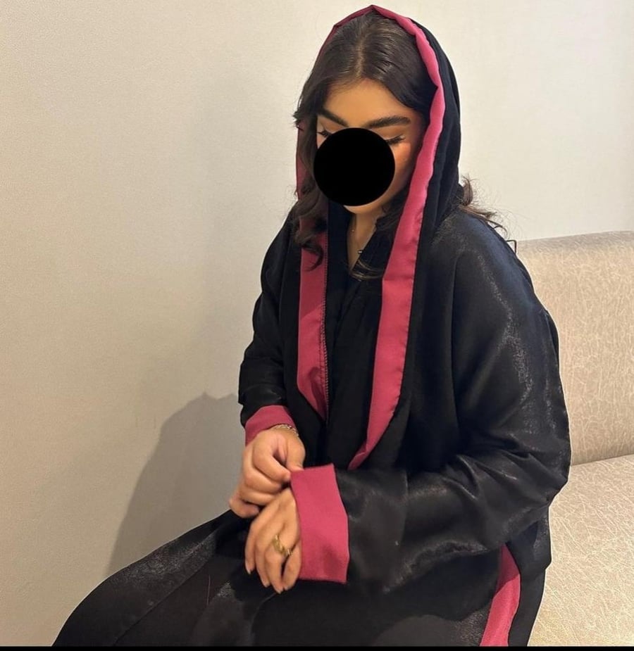 Cloth black silk with a tear between you