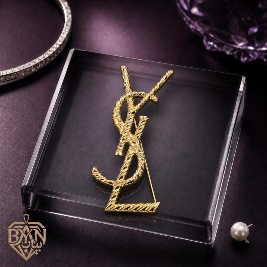 بروش سان لوران هاي كوالتي ذهبي بتصميم YSL ملتف