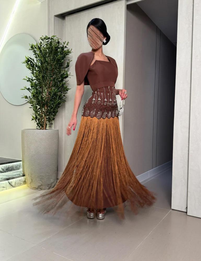 Brown dress with crystal details and fringe