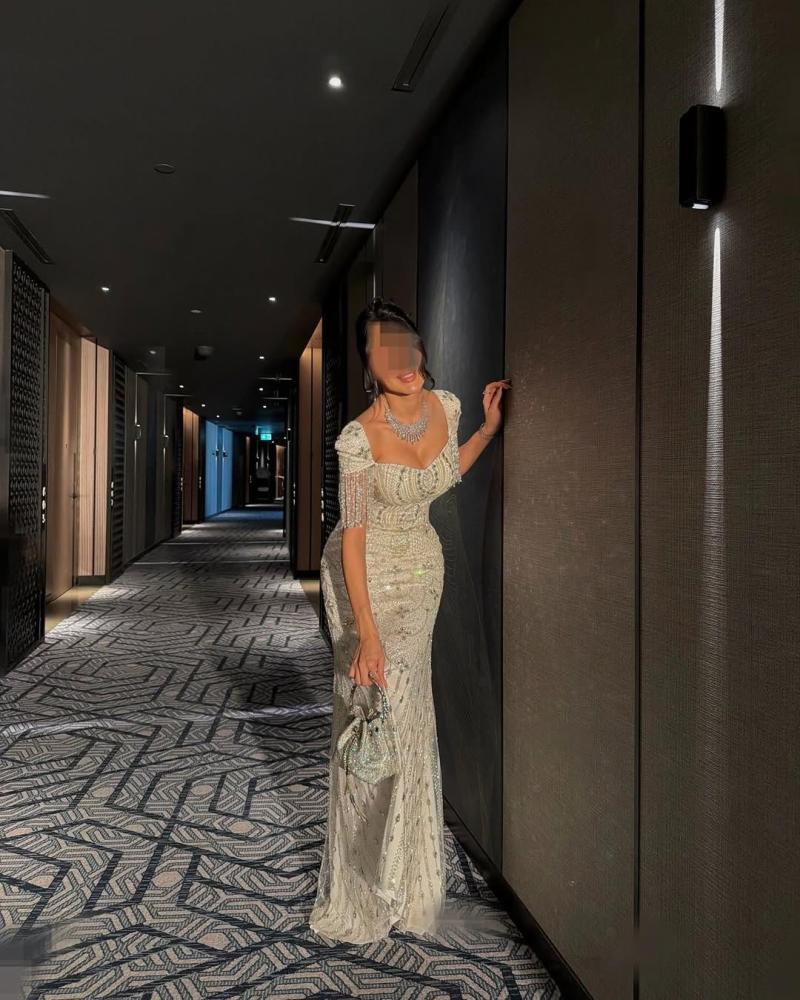 Evening dress embroidered in beige color