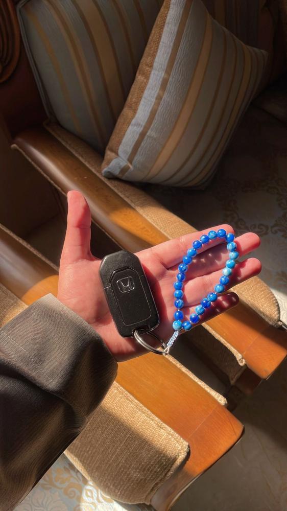 ميدالية ازرق مموج