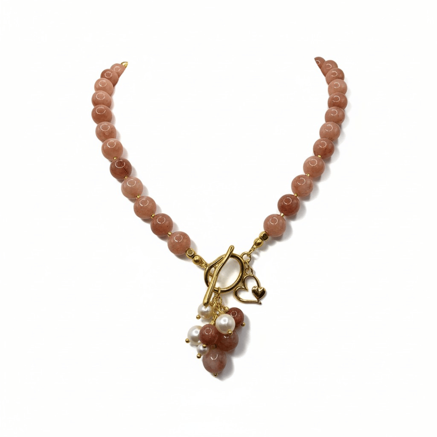 The gentle set, made of Caledonian agate stone with natural cultivated pearl.