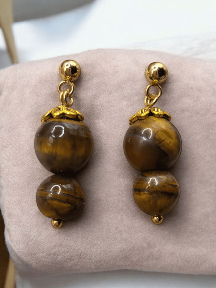 Earrings of natural tiger's eye stone