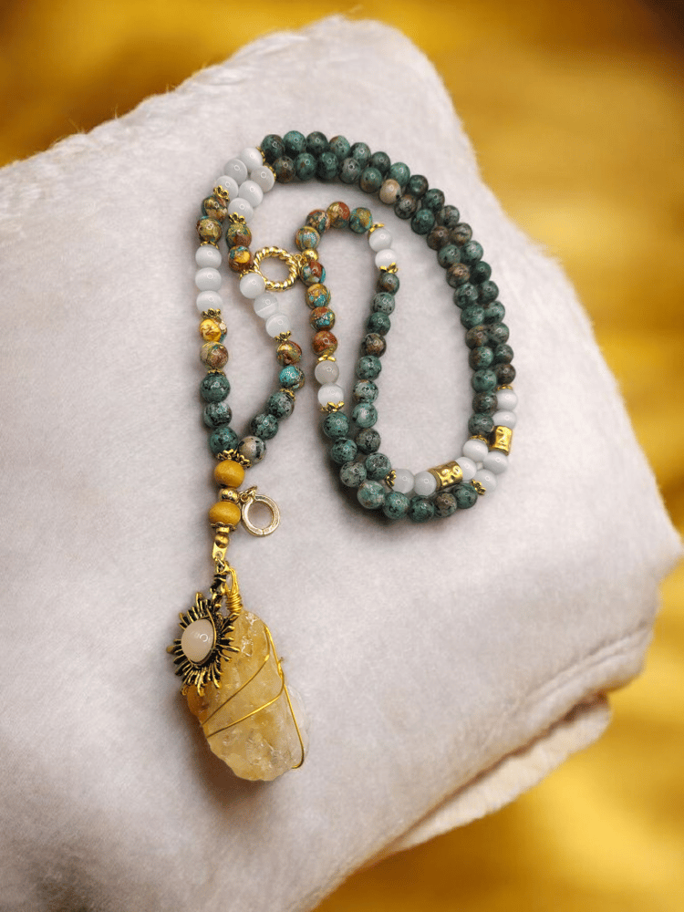 Rosary necklace 99 beads carved from African turquoise and white howlite, decorated with a beautiful piece of natural raw citrine stone
