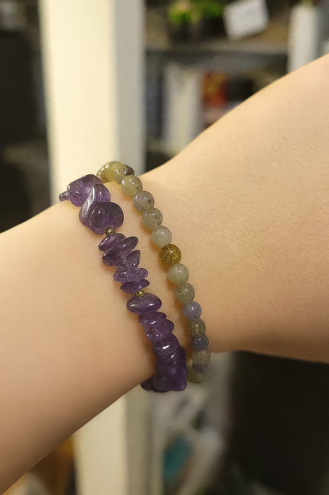 A soft bracelet, two strands, enhanced with mental calmness.. A mix of natural peacock stone with natural amethyst quartz.