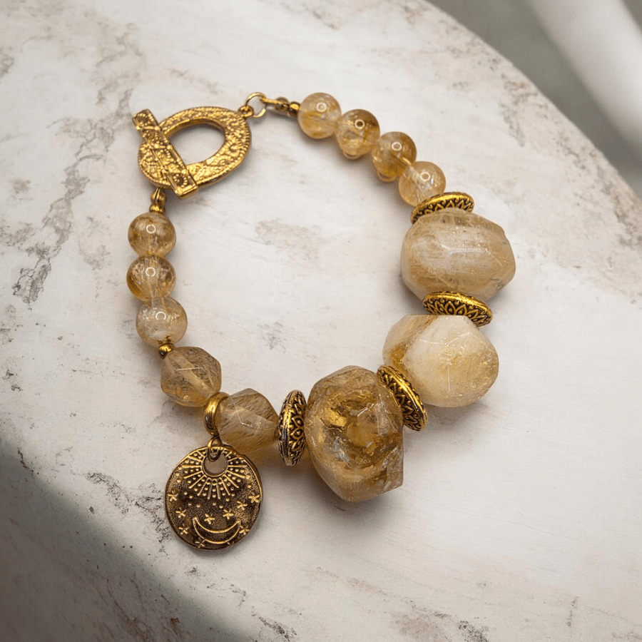A distinctive bracelet made of raw citrine stone, enhanced for focus and prosperity
