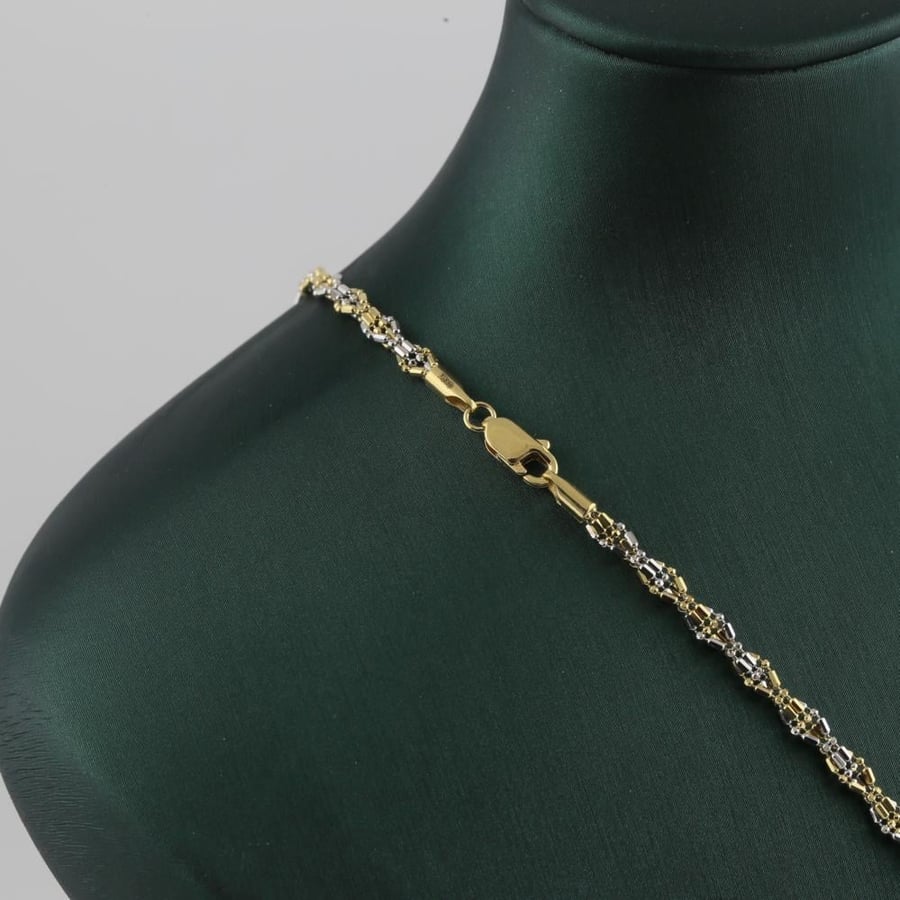 Gold bracelet with a distinctive geometric design, two-tone, 18 karat