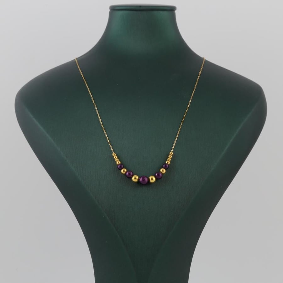Gold necklace with gold balls in maroon color - 21 karat