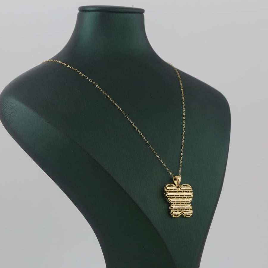 Half gold set with geometric butterfly design, shiny - 21 karat