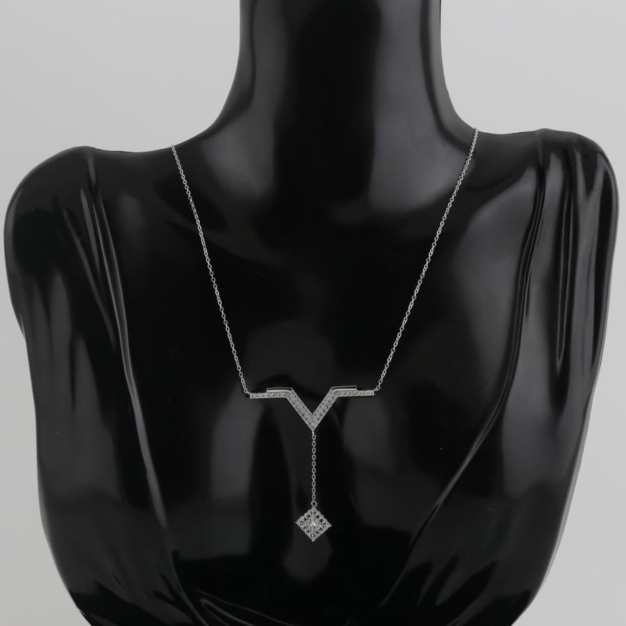 White gold ring with V letter design and a specific pendant - 18 karat