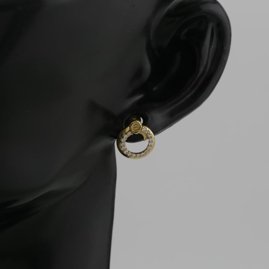 Gold ring with a wrapped design and sparkling stones - 18 karat