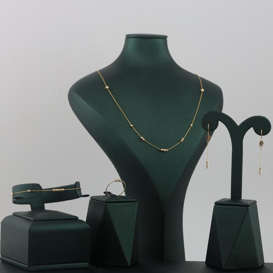 Soft gold set with laser balls - 21 karat