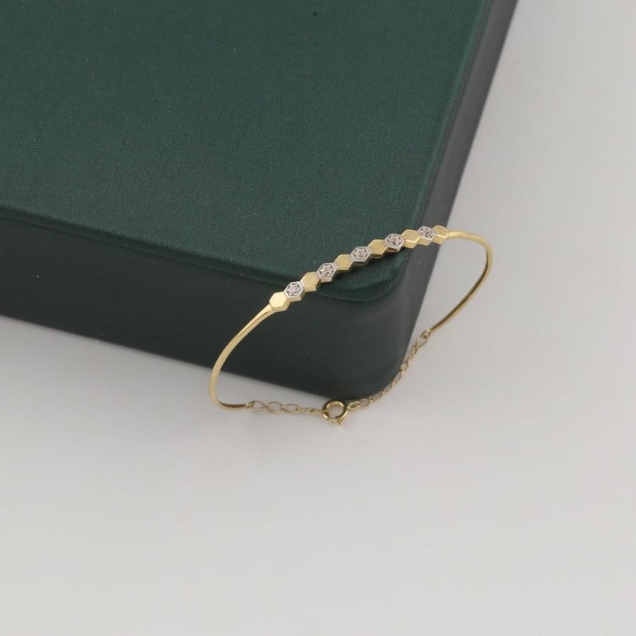 Children's gold bracelet with a hexagonal design with shiny parts - 18 karat