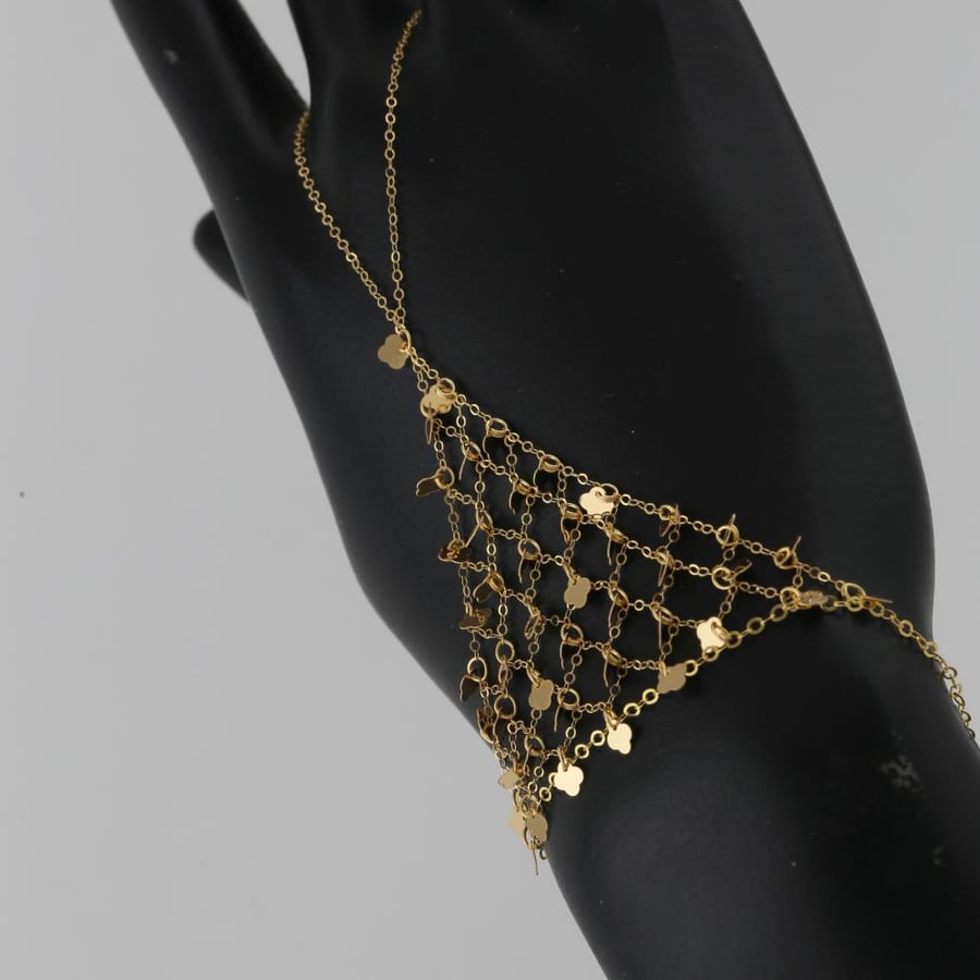 Gold hand with plant four-leaf clover - 21 karat