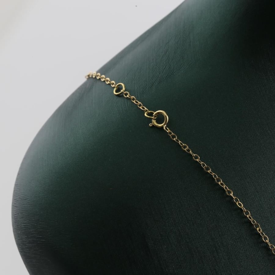 Half a gold set with a distinctive eye-catching design - 18 karat