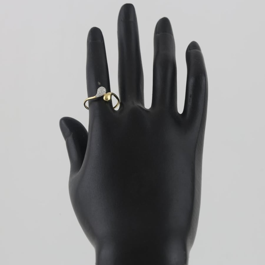 Gold ring separate with tear edges with shiny parts - 18 karat