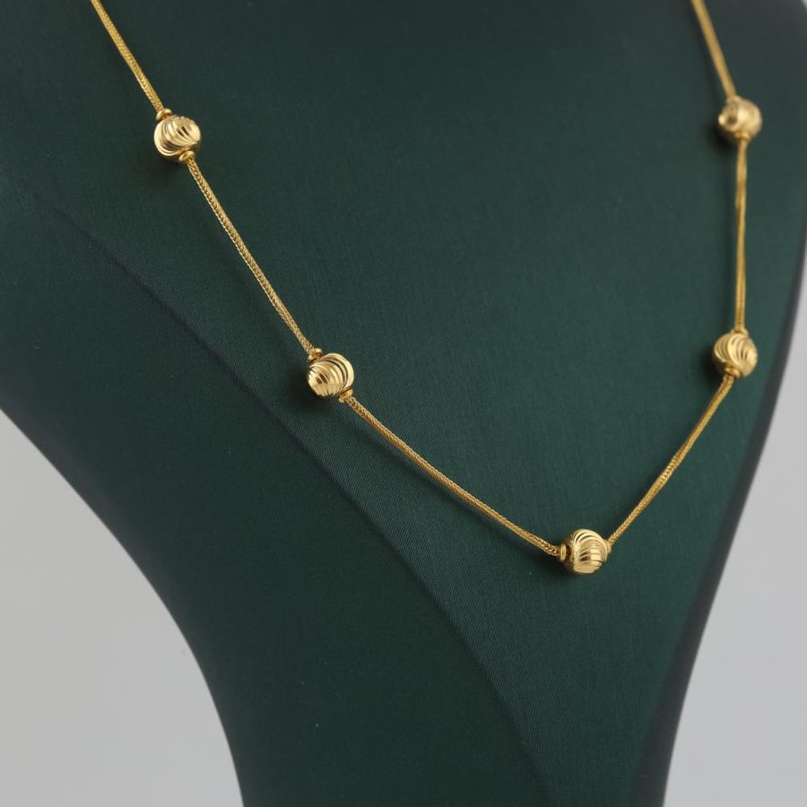 Soft gold necklace with laser balls - 21 karat