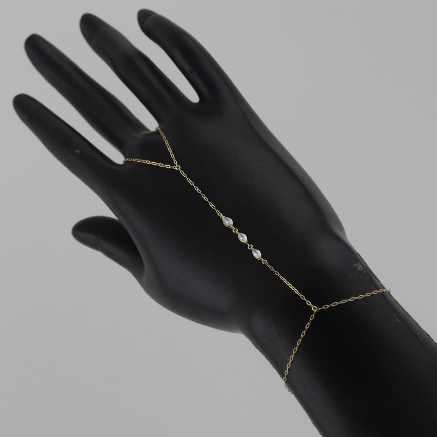 Gold cuff with specific set stones design, shiny - 18 karat