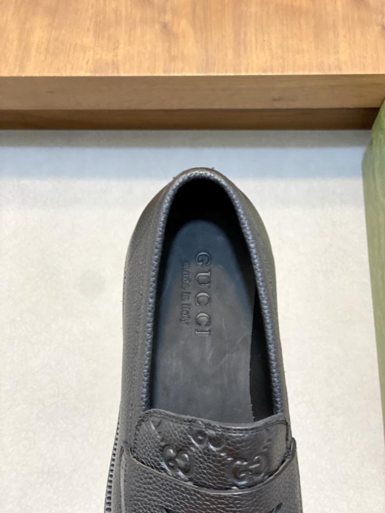 Gucci GG Embossed Leather Loafers