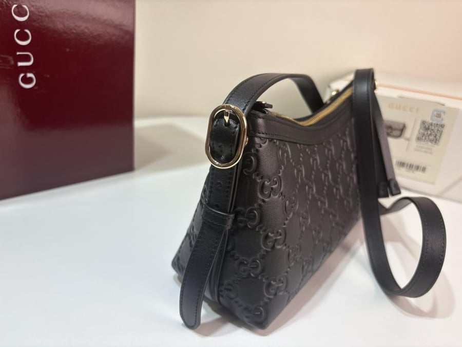 Gucci GG Embossed Leather Shoulder Bag – Black