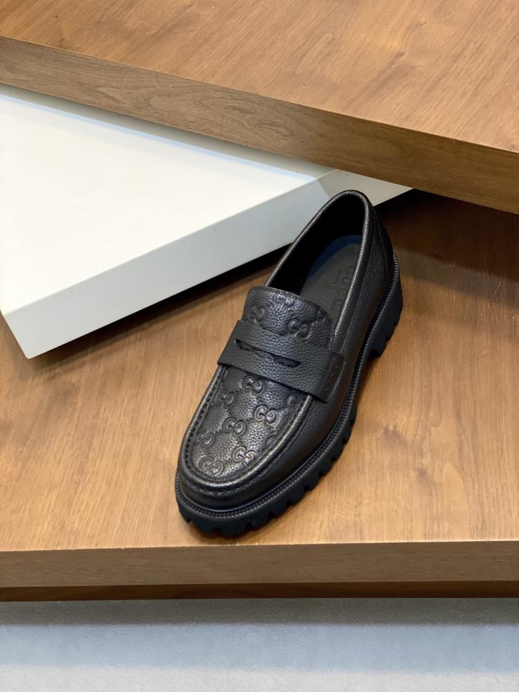 Gucci GG Embossed Leather Loafers