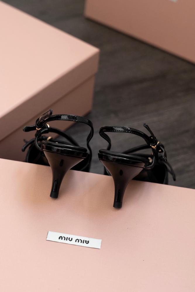 Miu Miu Patent Leather Slingback Pumps