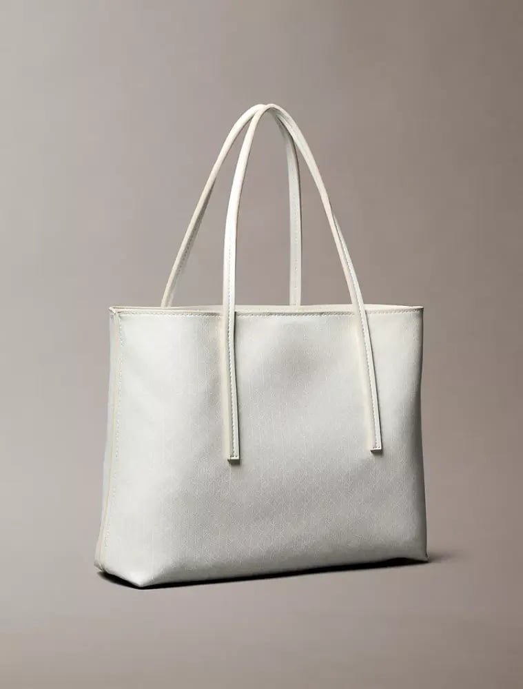 شنطه كالفن كلاين مع باوتش متوسطه الحجم Allover Emblem Logo Small Tote Bag with Pouch
