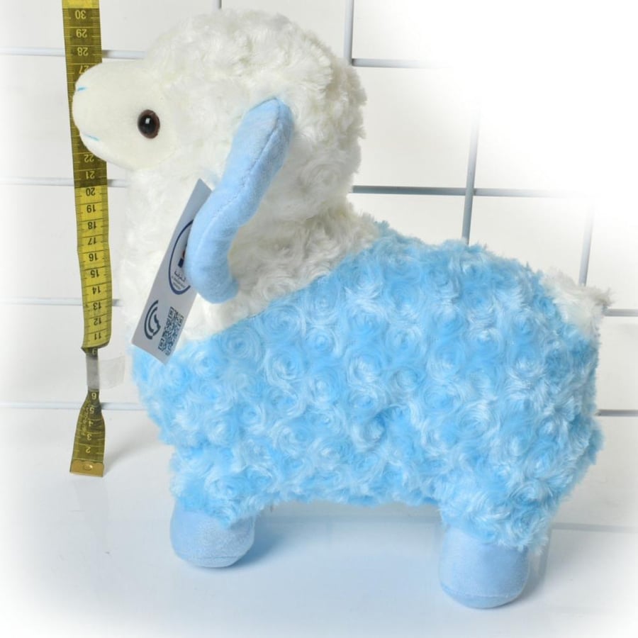 Small sheep doll in blue and white