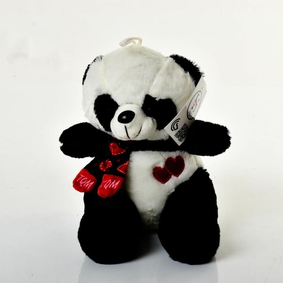 Panda bear doll with a red tie, remarkable